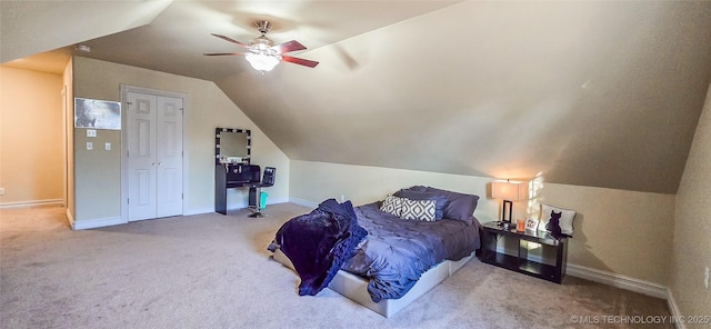 bedroom with baseboards, carpet, ceiling fan, and lofted ceiling