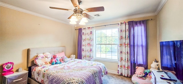 carpeted bedroom with baseboards, visible vents, ornamental molding, and ceiling fan