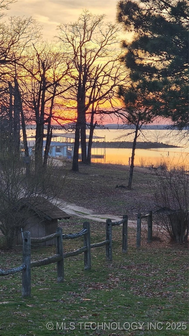 view of property's community with fence