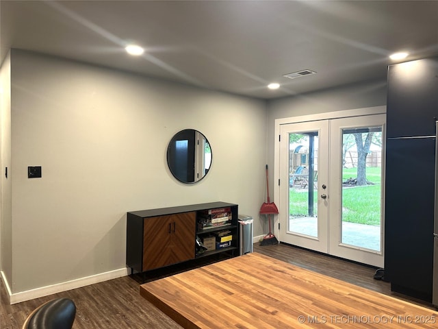 doorway to outside featuring french doors, recessed lighting, baseboards, visible vents, and dark wood-style floors
