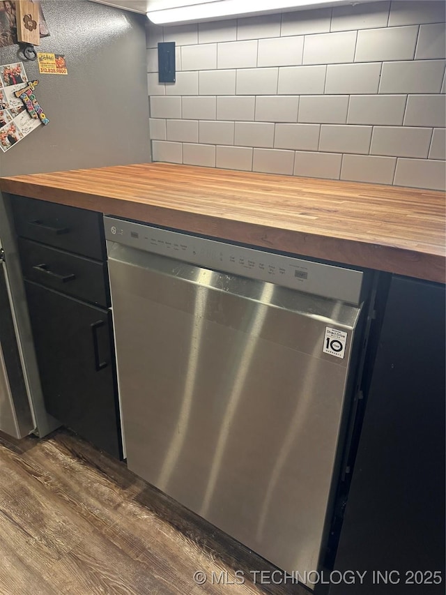 details featuring wood counters, dark wood finished floors, and dishwasher