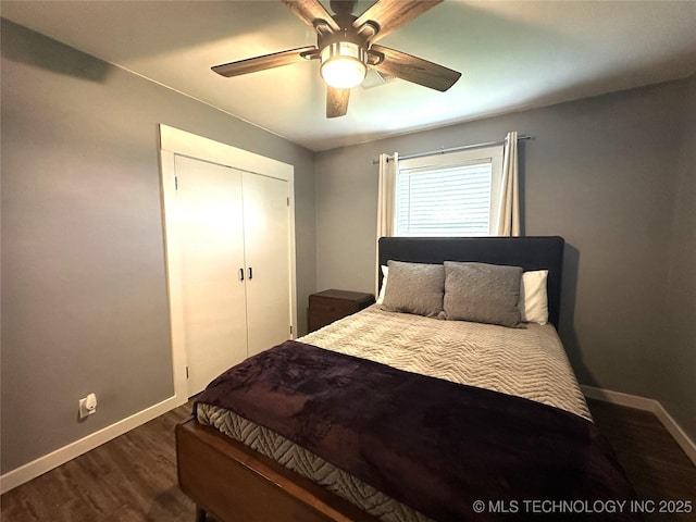 bedroom with baseboards, ceiling fan, a closet, and wood finished floors