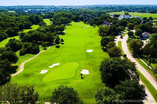 birds eye view of property featuring golf course view