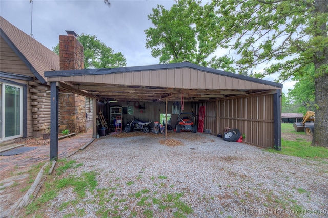 16703 Grisham Ave, Sapulpa, OK 74066 - view of car parking featuring a detached carport and gravel driveway