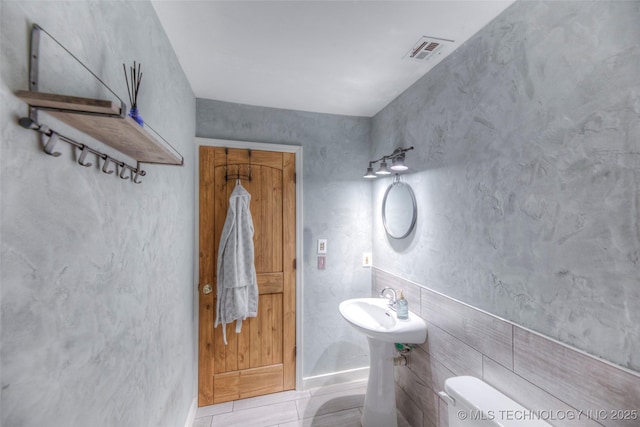 16703 Grisham Ave, Sapulpa, OK 74066 - half bathroom featuring toilet and tile patterned floors