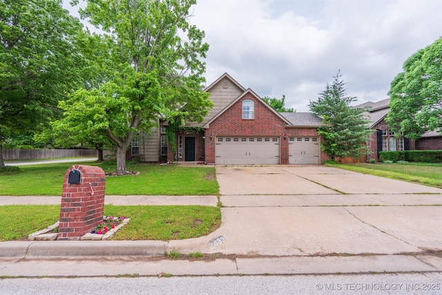 traditional-style home featuring a garage, brick siding, fence, a front lawn, and concrete driveway