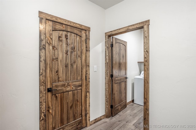 hall with light wood finished floors