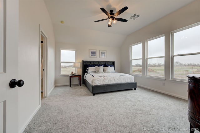 bedroom with baseboards, visible vents, multiple windows, and carpet