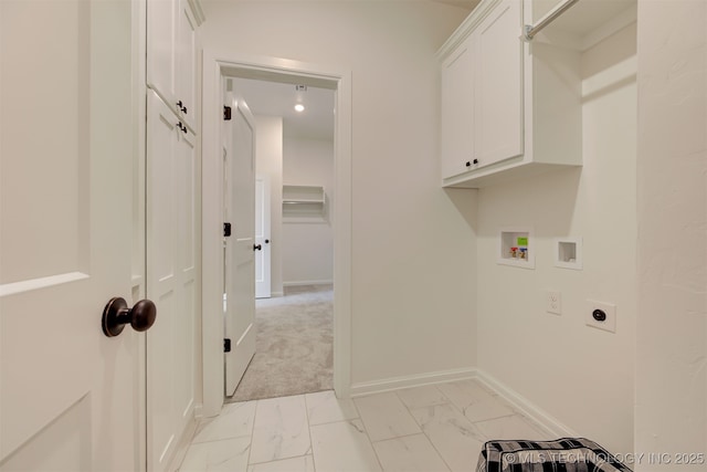 laundry room with electric dryer hookup, cabinet space, baseboards, hookup for a washing machine, and marble finish floor