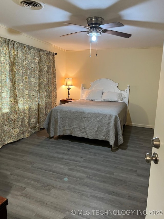 1029 N Kenwood Ave, Broken Arrow, OK 74012 - bedroom featuring ceiling fan, visible vents, ornamental molding, and wood finished floors