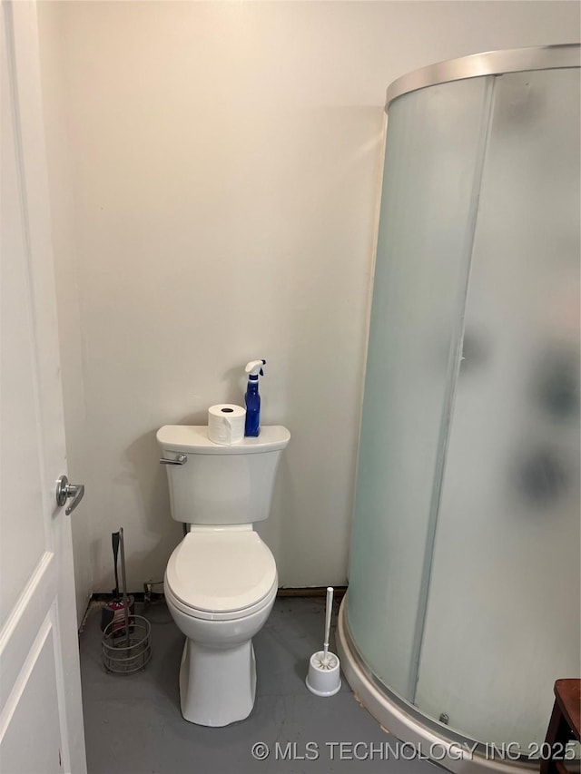 1029 N Kenwood Ave, Broken Arrow, OK 74012 - full bathroom featuring toilet, concrete flooring, and a stall shower