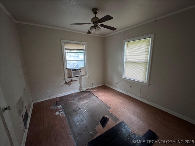 empty room with wood-type flooring, ceiling fan, crown molding, and cooling unit
