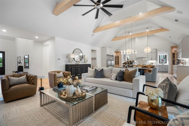 living room with ceiling fan with notable chandelier, recessed lighting, beam ceiling, and visible vents