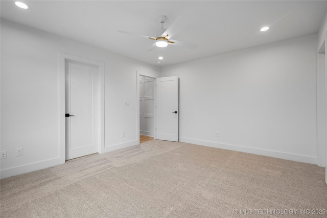 unfurnished bedroom featuring recessed lighting, baseboards, light colored carpet, and ceiling fan