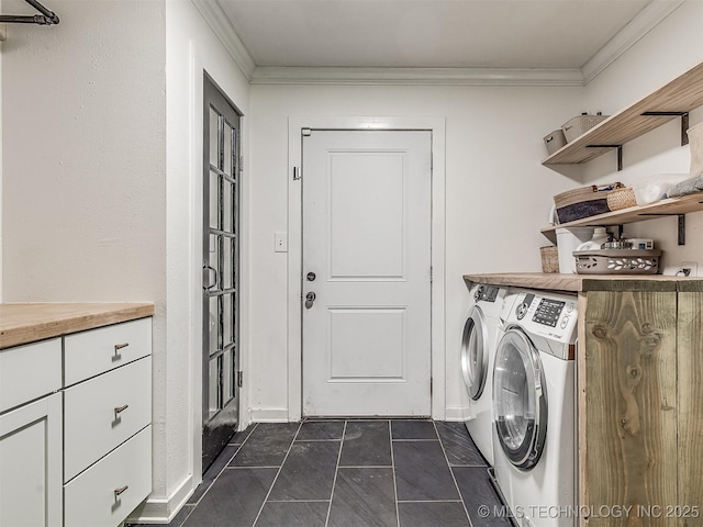 laundry area with laundry area, ornamental molding, and independent washer and dryer