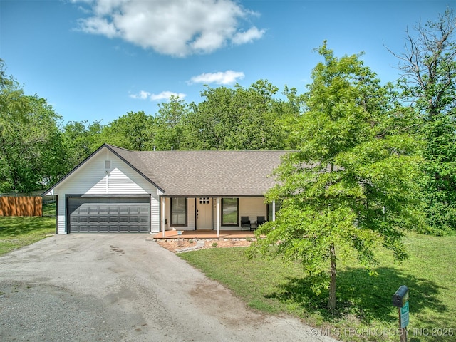 ranch-style home featuring a porch, aphalt driveway, a garage, a front lawn, and a shingled roof