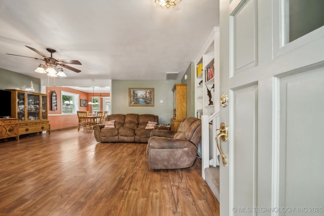 6605 S 1st St, Broken Arrow, OK 74012 - living room with wood finished floors and a ceiling fan