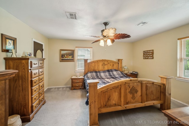 6605 S 1st St, Broken Arrow, OK 74012 - bedroom featuring multiple windows, carpet floors, and a ceiling fan