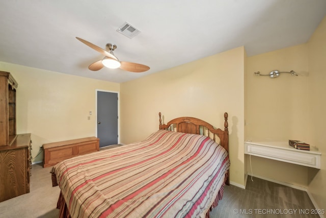 6605 S 1st St, Broken Arrow, OK 74012 - carpeted bedroom with ceiling fan and baseboards