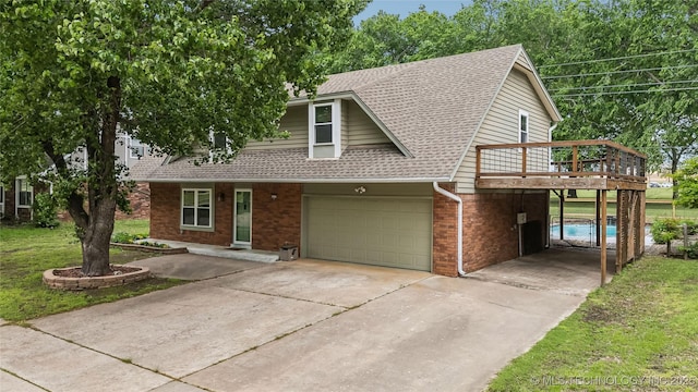 rustic home featuring a wooden deck, brick siding, concrete driveway, an attached garage, and a shingled roof