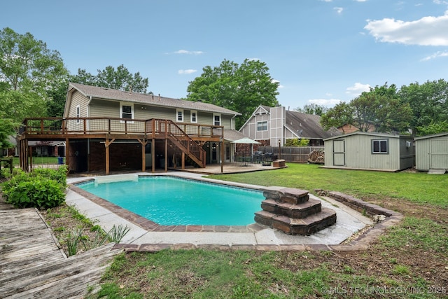 6605 S 1st St, Broken Arrow, OK 74012 - view of swimming pool featuring a wooden deck, a shed, stairs, a fenced backyard, and a patio area