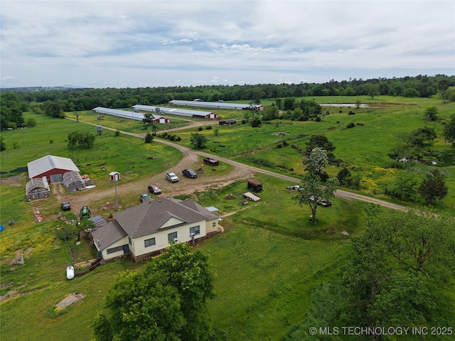 birds eye view of property featuring a rural view