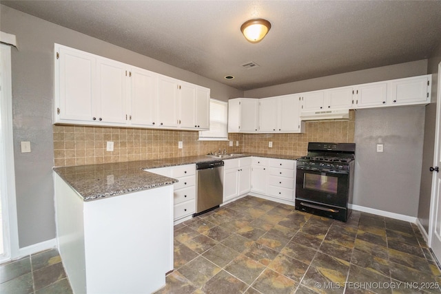 1160 S 124th E Ave, Tulsa, OK 74128 - kitchen featuring black range with gas stovetop, dishwasher, a sink, stone tile flooring, and dark stone countertops