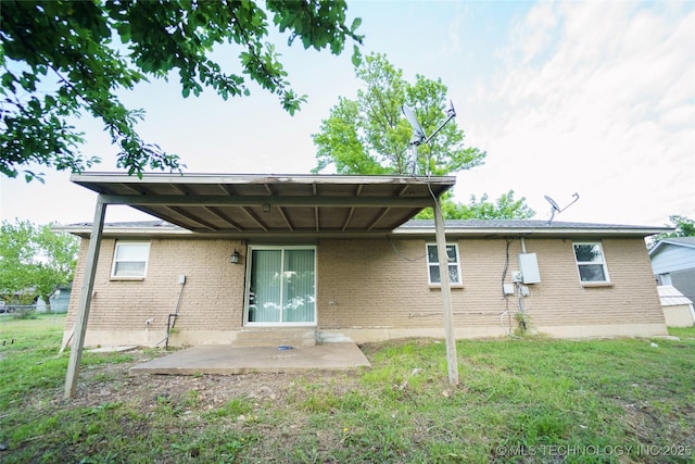 1160 S 124th E Ave, Tulsa, OK 74128 - rear view of house featuring a patio area and brick siding