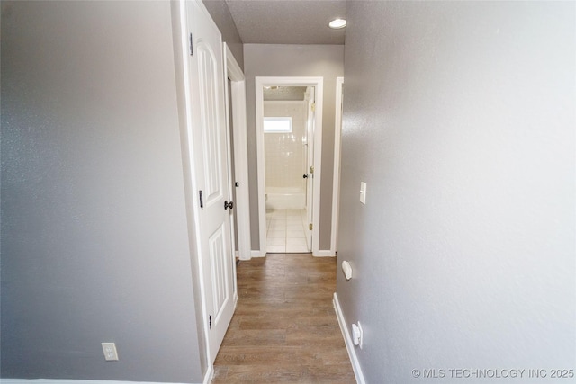 1160 S 124th E Ave, Tulsa, OK 74128 - hallway with wood finished floors and baseboards