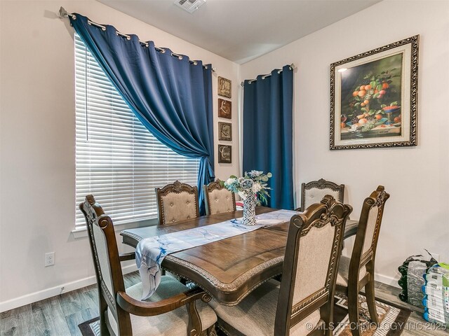 6342 E 148th St S, Bixby, OK 74008 - dining area featuring wood finished floors and baseboards