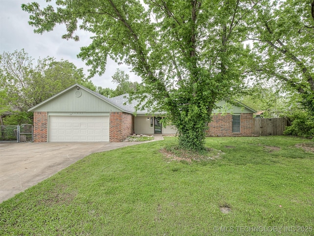 ranch-style home with fence, a front yard, brick siding, concrete driveway, and an attached garage