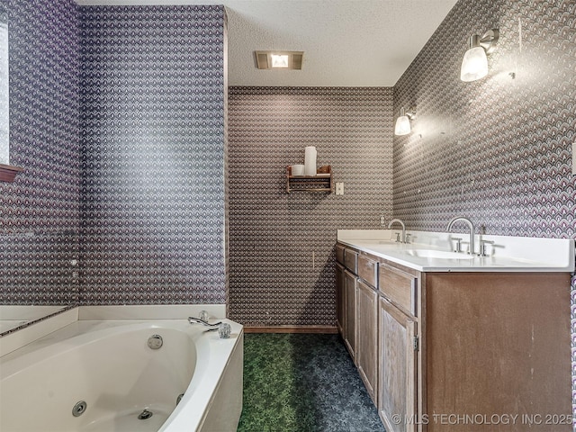 full bathroom with a whirlpool tub, a sink, double vanity, and wallpapered walls