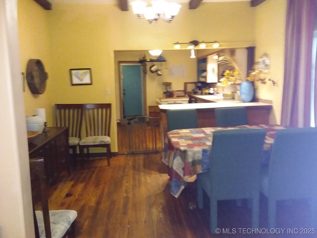 1324 E Hickory St, Okmulgee, OK 74447 - dining room featuring a notable chandelier and wood finished floors