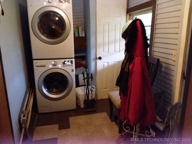 1324 E Hickory St, Okmulgee, OK 74447 - clothes washing area featuring laundry area and stacked washer and dryer