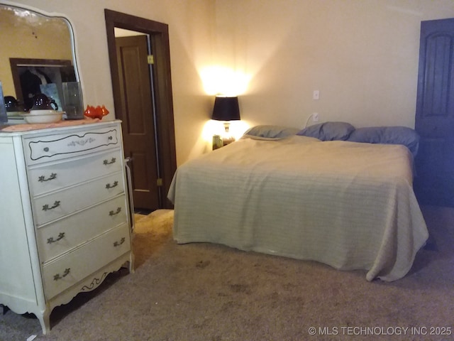 1324 E Hickory St, Okmulgee, OK 74447 - view of carpeted bedroom