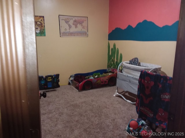 1324 E Hickory St, Okmulgee, OK 74447 - view of carpeted bedroom
