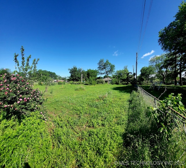 1324 E Hickory St, Okmulgee, OK 74447 - view of yard featuring fence and a rural view
