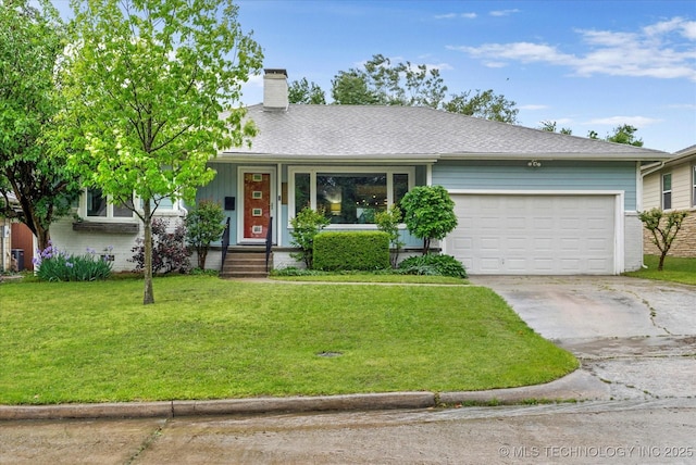 view of front of house with an attached garage, a front lawn, brick siding, a chimney, and driveway