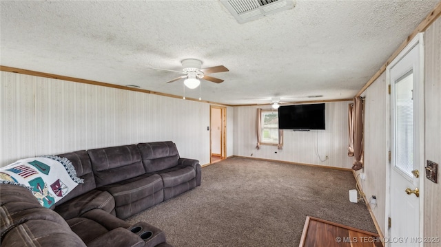 25505 S 4111th Rd, Claremore, OK 74019 - living area featuring carpet flooring, a textured ceiling, ceiling fan, and visible vents