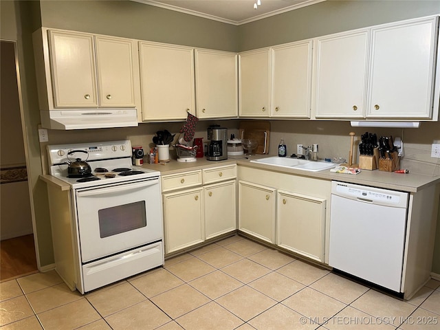 2124 E 60th Ct Unit O-4, Tulsa, OK 74105 - kitchen featuring white appliances, under cabinet range hood, ornamental molding, light countertops, and light tile patterned floors