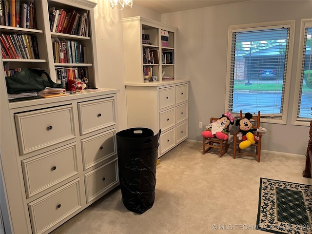 2124 E 60th Ct Unit O-4, Tulsa, OK 74105 - sitting room with light colored carpet