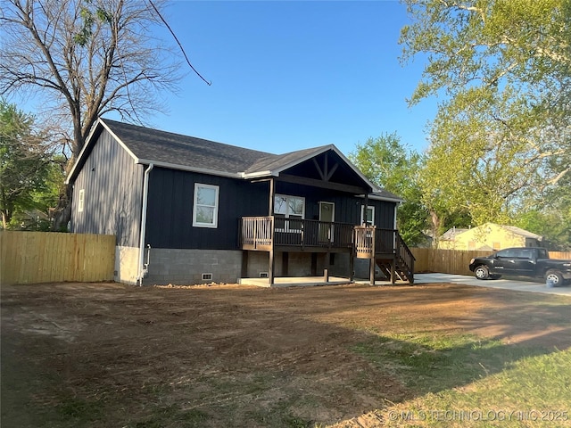 5114 W 3rd St, Tulsa, OK 74127 - view of front of home featuring stairs, fence, and a deck