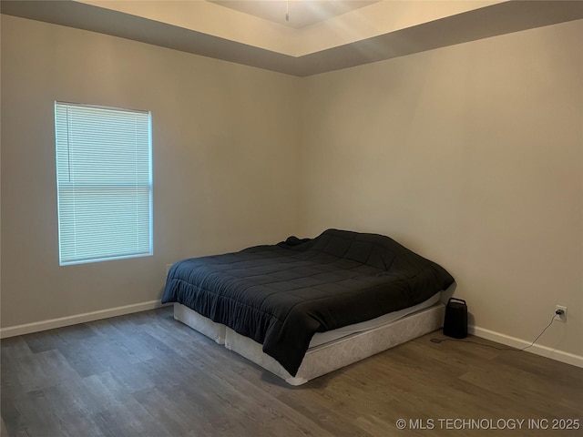 5114 W 3rd St, Tulsa, OK 74127 - bedroom featuring baseboards and wood finished floors