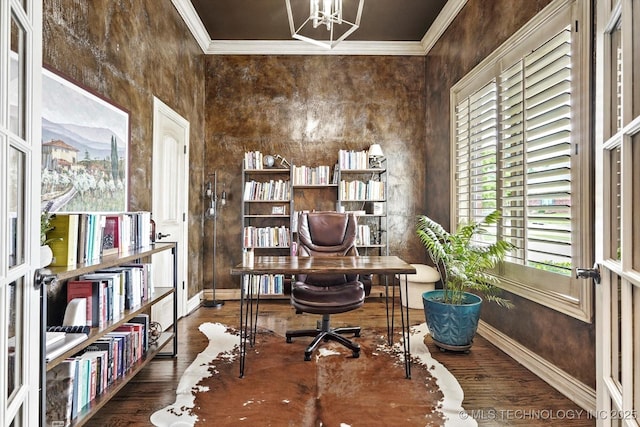 office featuring crown molding, baseboards, wood finished floors, and an inviting chandelier