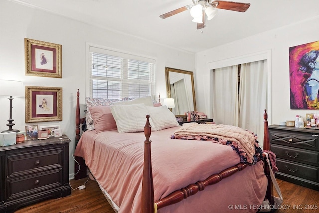 5729 E 25th Pl, Tulsa, OK 74114 - bedroom with ceiling fan and dark wood-type flooring