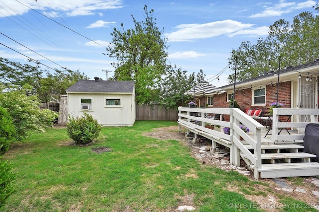 5729 E 25th Pl, Tulsa, OK 74114 - view of yard with fence, an outdoor structure, and a deck
