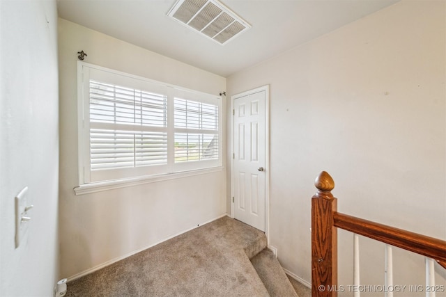interior space with visible vents and baseboards