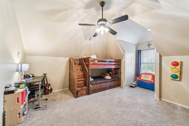 carpeted bedroom featuring baseboards, ceiling fan, and vaulted ceiling