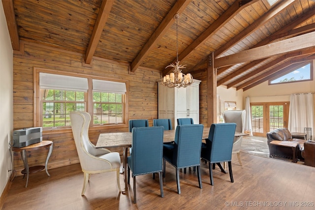 53402 E 332nd Loop, Jay, OK 74346 - dining space featuring a chandelier, wood finished floors, wooden ceiling with exposed beams, plenty of natural light, and high vaulted ceiling