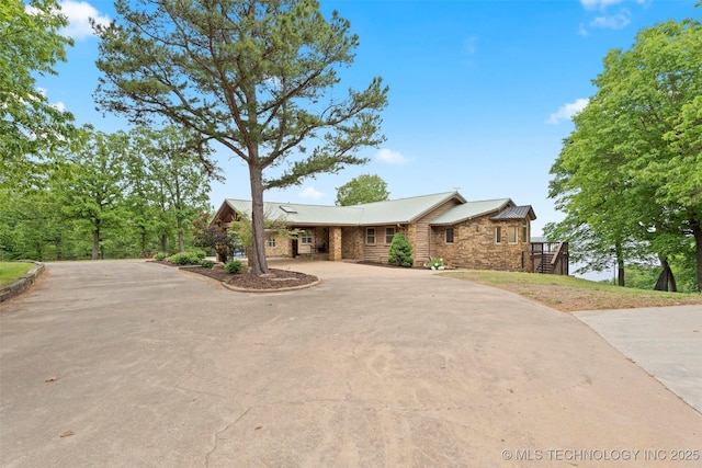 53402 E 332nd Loop, Jay, OK 74346 - view of front of house featuring curved driveway and metal roof
